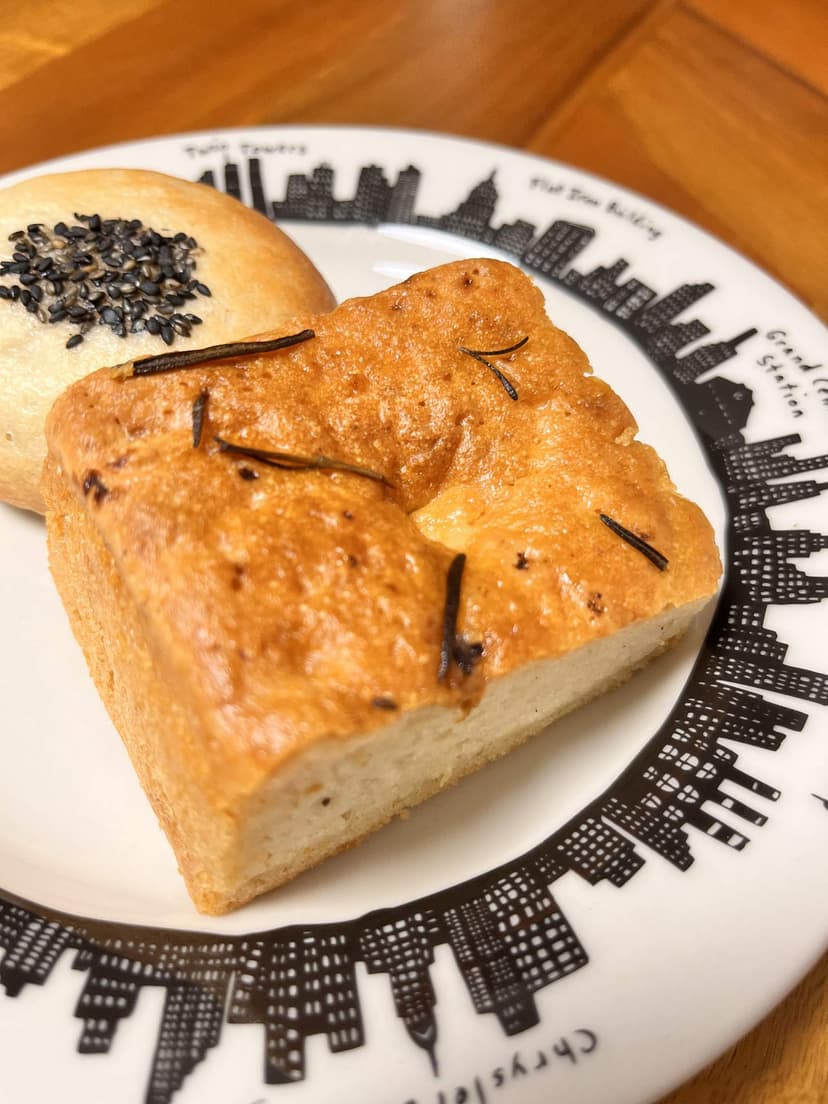 The focaccia, with its salted crust and a slice of the soft potato crumb