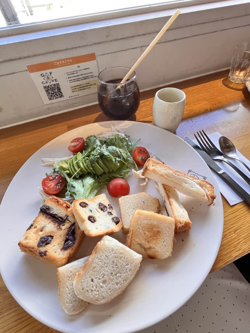 The lunch plate with an iced coffee and the QR ordering card
