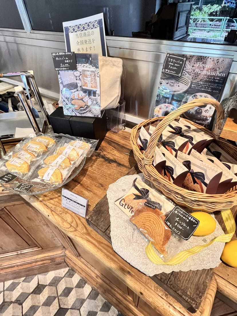 Inside the shop, with the bread displays along the wall