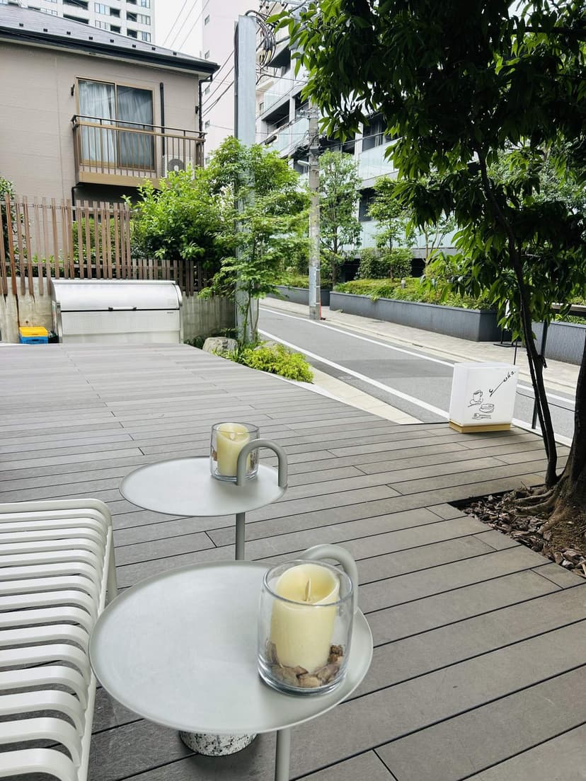 The terrace looks out on a quiet residential street